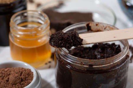 Chocolate face and body scrub. Homemade spa cosmetic recipe. Home beauty concept. DIY cosmetics. Close up.の写真素材