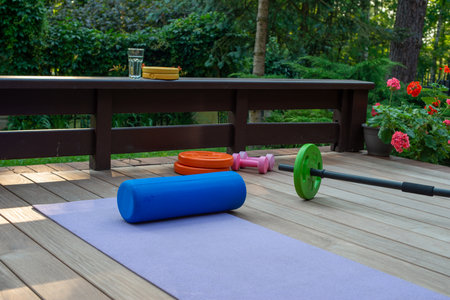 Home training equipment on home yard terrace. Fitness at home. Healthy, training and lifestyle concept.の写真素材