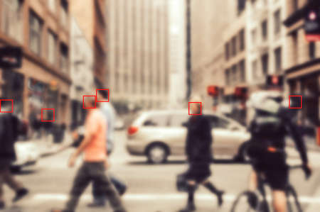 Face recognition signs and tags on people faces. Privacy and personal data protection.の写真素材