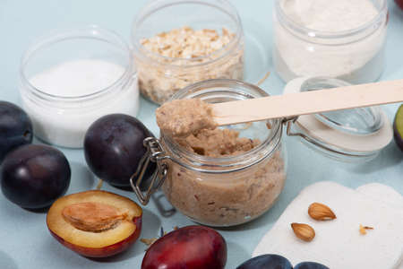 Plum face and body scrub. Homemade spa cosmetic recipe.の写真素材