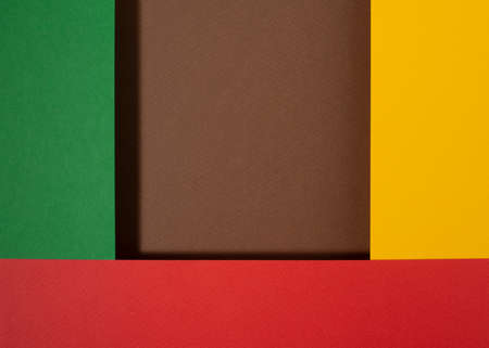 Black history month colors background. Red, green and yellow paper cut abstract composition.の写真素材