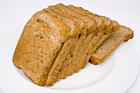 Slices of wholemeal bread on a white plate