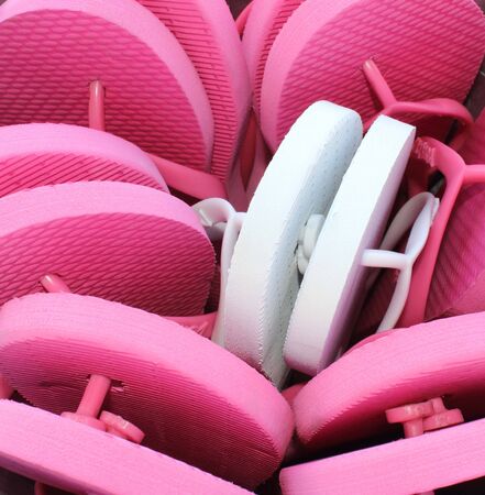 Pink and white flip flop rubber thongsの写真素材