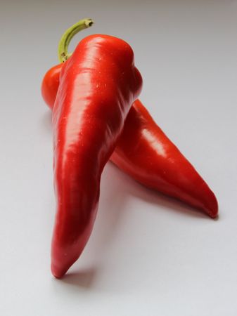 Red capsicum bell pepper with stalkの写真素材