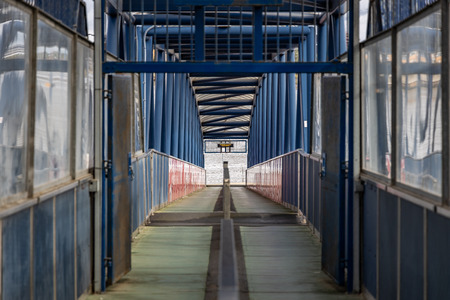 River approach walkway footbridge tunnel to the River Thamesのeditorial素材