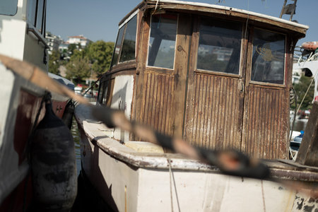 Two wooden boats standing next to each other in the marina
