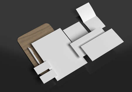 Stationery branding mockup template with red A4 Letterhead, business card, envelope, note book pencil, trifold brochure. dark backgroundの写真素材