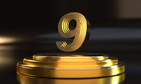 Number 9 above triple gold pedestal with dark backgroundの写真素材