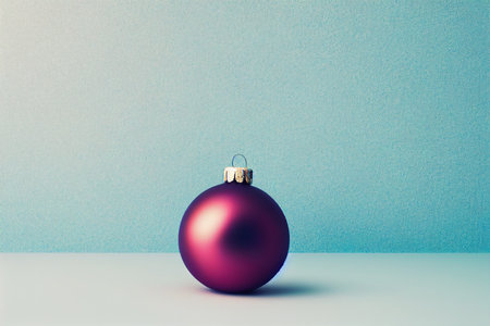 Violet christmas ball on blue background with copy space, retro tonedの写真素材