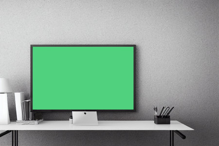 Modern workspace with blank green screen on the wall. 3D Renderingの写真素材