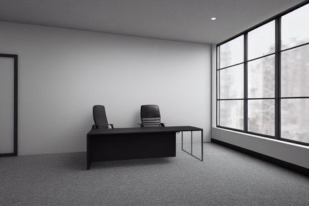 Interior of modern office with white walls, concrete floor, long black computer table with black chairs and window with blurry cityscape. 3d renderingの写真素材