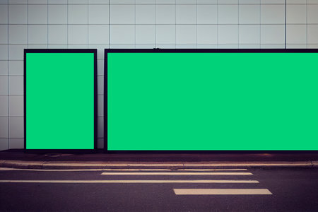 Blank green billboard on the street in the city. 3d renderingの写真素材