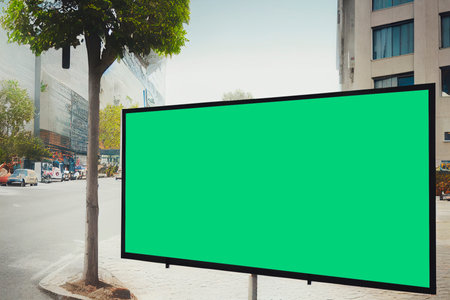 Blank green billboard on city street. Mockup, 3D Renderingの写真素材