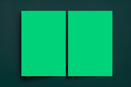 Blank green business card on green background. Template for branding identity.の写真素材