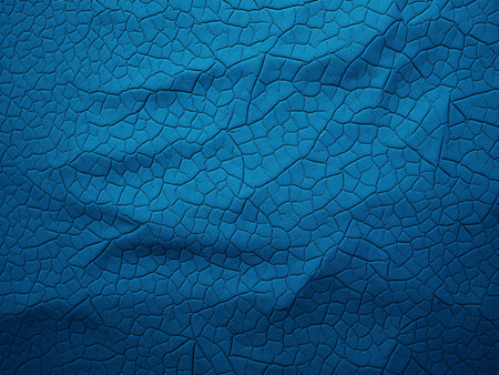 Blue cracked leather texture close up. Abstract background and texture for design.
