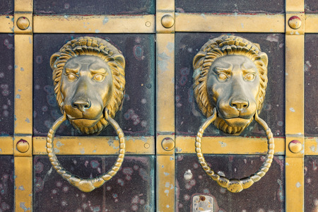Very old lion hed door knobの写真素材