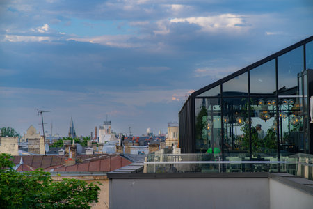 View of the city from the roof of the building in the eveningの写真素材
