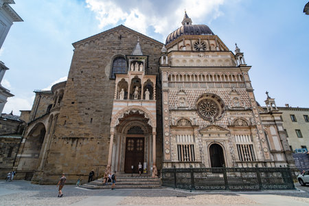 The intricate facade of Basilica di Santa Maria Maggiore in Bergamo, showing Romanesque and Renaissance architectural details.の写真素材