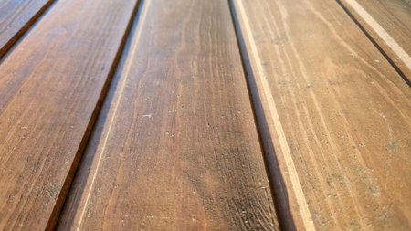 High-resolution close-up of textured wooden panels showing natural grain and subtle details.の写真素材