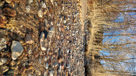 Crisp Winter Morning by the Rocky Riverの写真素材