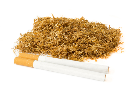 Dried of tobacco and cigarettes isolated on white backgroundの写真素材