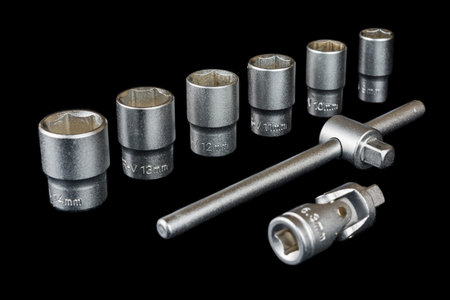 Set of socket wrench isolated on black background