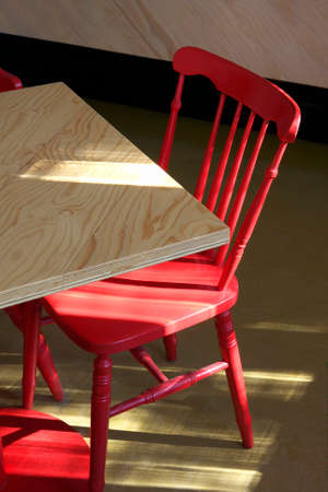 Red oldfashioned chair in pub interior.の写真素材