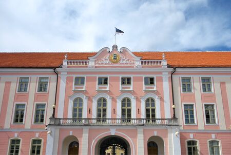 Facade of Estonian Parliament House with Estonian flag and big emblem in Toompea Castle.のeditorial素材
