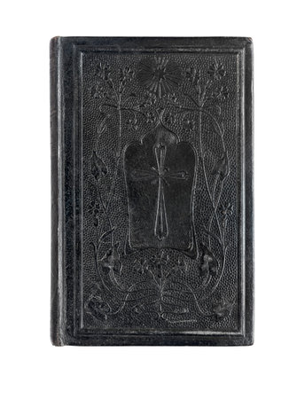 100 years old pocket bible, ornated  leather cover, isolated on white.
