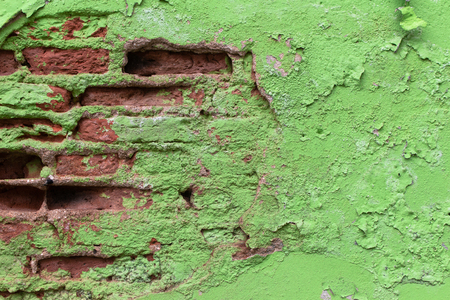 Green wall cracked concrete vintage wall background,old wallの写真素材