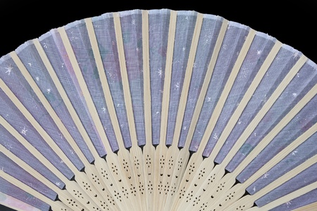 asian fan isolated on black の写真素材