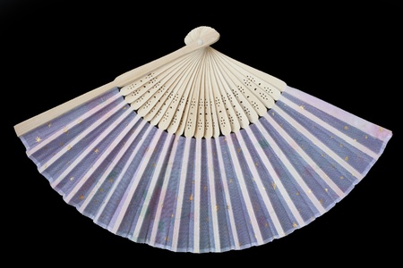 asian fan isolated on black の写真素材