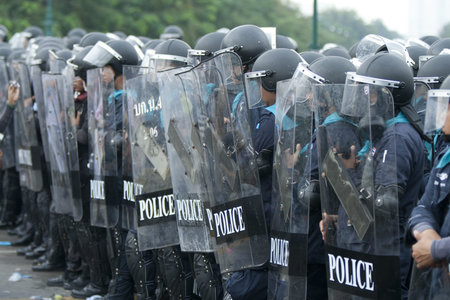BANGKOK,THAILAND-NOVEMBER,24 Police Commandos guard a barricade on Makkhawan Bridge outside...