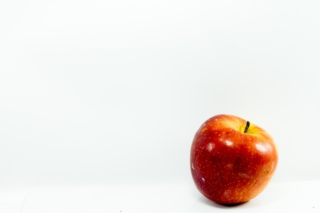 red apple on a white backgroundの写真素材