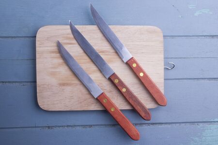 kitchen knife with a cutting boardの写真素材