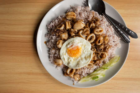 Khao Pad Ka Prao Pla Muek Kai Dao, thai food styleの写真素材