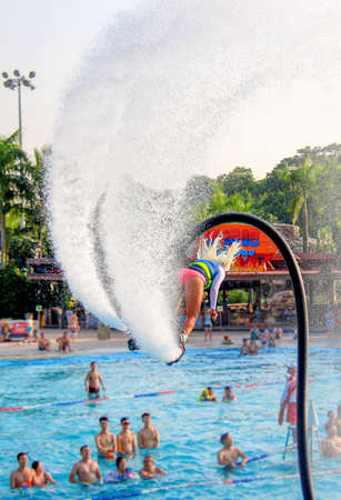 Fly board womanのeditorial素材