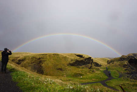Rainbow on the horizon, near Arnarstapi, Icelandの写真素材