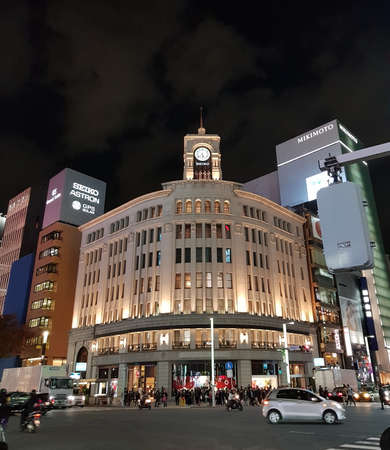 Ginza Wako clock tower is the symbol of Ginza. Well known for luxury specialised department store. Right in front of the busy road junction. Built in a Neo Renaissance style. Ginza, Tokyo, Japan.のeditorial素材