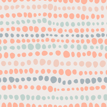 Aesthetic minimalist boho seamless pattern with hand drawn dots in mid century style in a natural color palette. Pastel naive nursery print design on a light background. Trendy kids backdrop.のイラスト素材