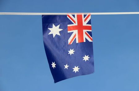 Mini fabric rail flag of Australia in blue red and white color with white star and Union Jack...