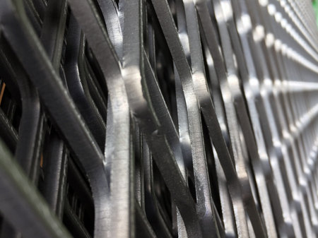 Angle of constricted of metal grille. pattern of Steel grating. It is a framework of spaced bars...