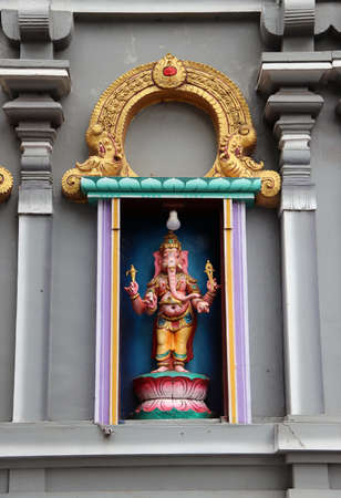 Colorful stucco Ganesha on camber altar at the temple of Hinduism and Brahmanism. The Lord of success, knowledge and arts.の写真素材