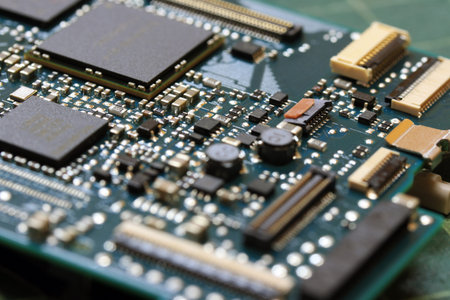 Electronics background technology close up of the green kit circuit board. Application Specific...