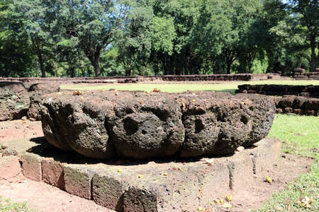 Laterite stone lotus blossom carved in archaeological site of Srithep ancient town at Petchaboon, Thailand. The influence of ancient Khmer culture in 11th-13th century A.D.の写真素材