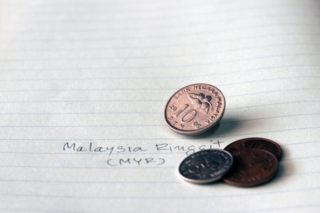 Ten sen Malaysia ringgit coin on reverse , Line image of Hibiscus rosa-sinensis and five sen with...