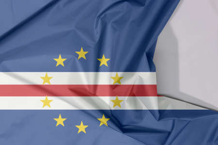 Cape Verde fabric flag crepe and crease with white space, blue white and red color with the circle of ten star.の写真素材
