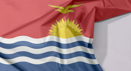 Kiribati fabric flag crepe and crease with white space, red and blue with the yellow frigate bird flying over the rising sun and three white wavy.の写真素材