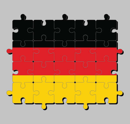 Jigsaw puzzle of Germany flag in the black red and yellow color. Concept of Fulfillment or perfection.のイラスト素材