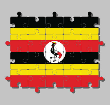 Jigsaw puzzle of Uganda flag in black yellow and red ; a white disc depicts the national symbol, a grey crowned crane. Concept of Fulfillment or perfection.のイラスト素材